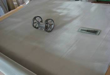 SS 304Q mesh cloth and quality test tools on it.