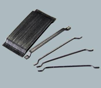 Une plaque colle fibre d'acier, et quelques fibres lâches à côté