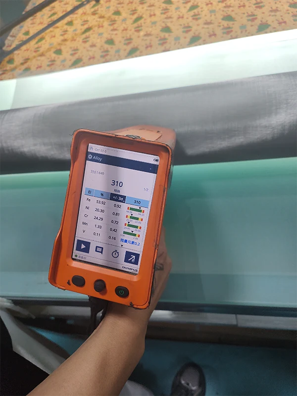 Measure the composition of 310S stainless steel woven wire mesh with a handheld detector.