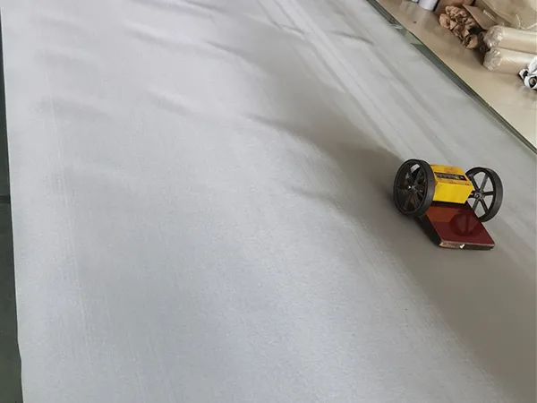 Front view inspection of tensile bolting cloth