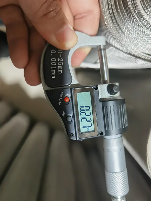 The wire diameter of twill weave mesh measured with a caliper is 0.227 mm.